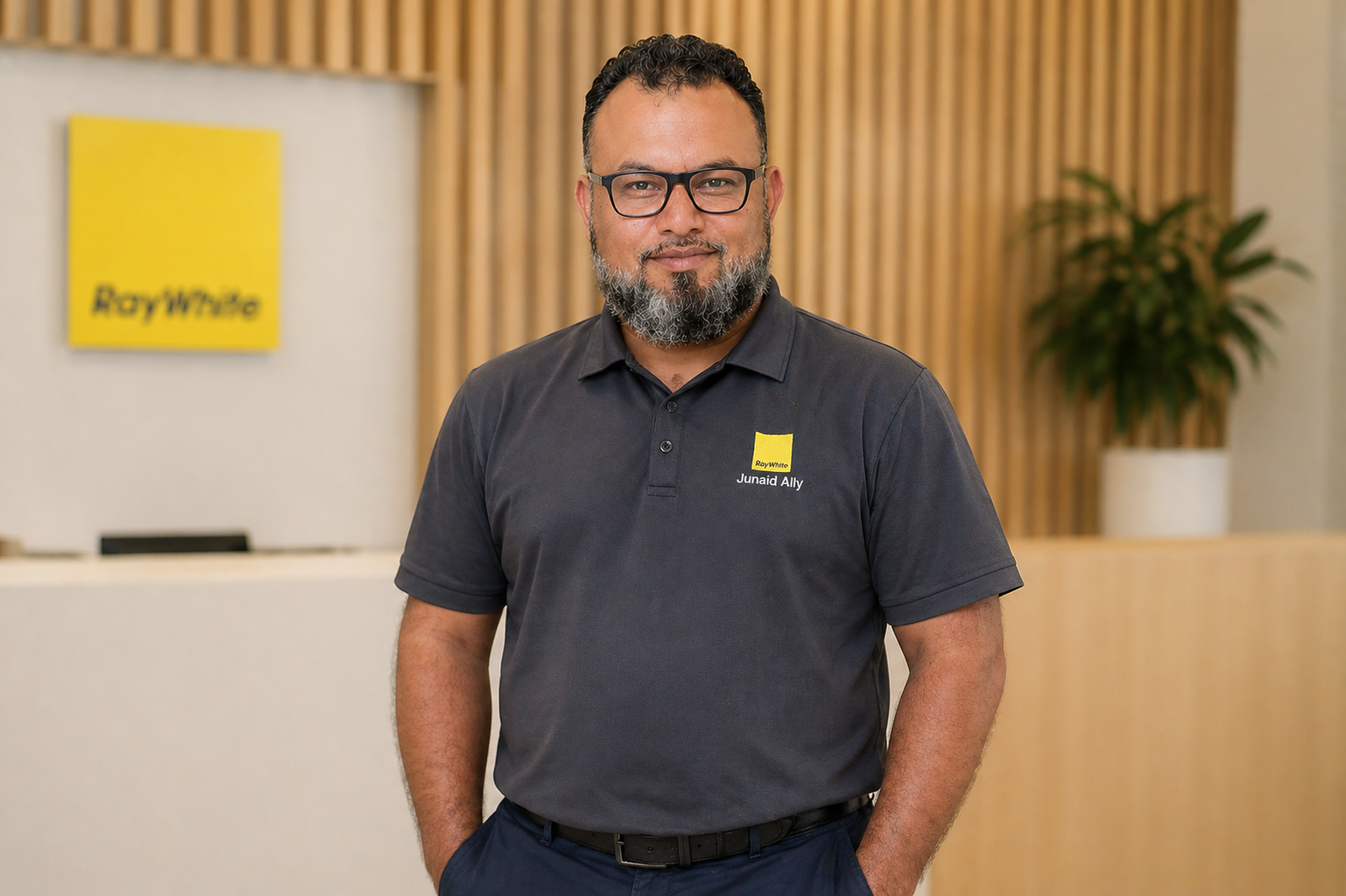Junaid Ally in Ray White polo